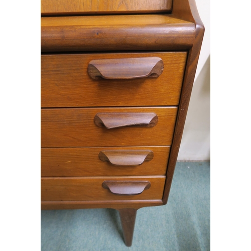 150 - A mid 20th century teak Younger four drawer writing bureau, 126cm high x 89cm wide x 47cm deep