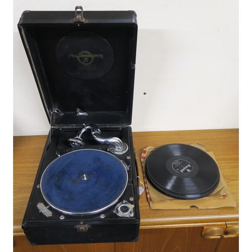 161 - A Columbia portable gramophone and a bag of assorted records 