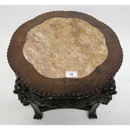 18 - An Oriental hardwood marble top occasional table