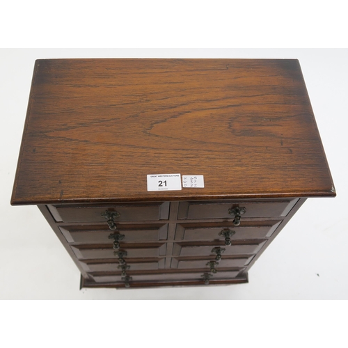 21 - A Victorian stained oak nine drawer apprentice chest, 45cm high x 37cm wide x 22cm deep