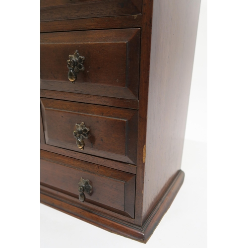 21 - A Victorian stained oak nine drawer apprentice chest, 45cm high x 37cm wide x 22cm deep