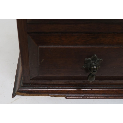 21 - A Victorian stained oak nine drawer apprentice chest, 45cm high x 37cm wide x 22cm deep