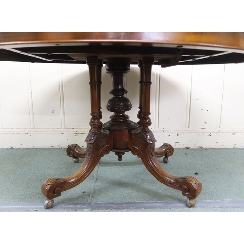 25 - A Victorian burr walnut inlaid oval tilt top breakfast table on carved quadrupedal base, 74cm high x... 