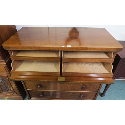 35 - A Victorian walnut chest of drawers with three drawers below fall front compartment containing four ...