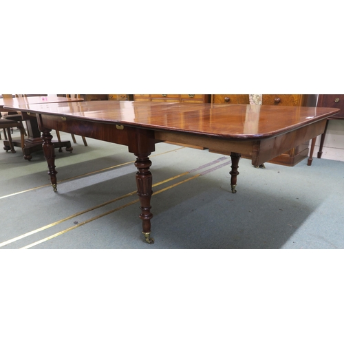 44 - A Victorian mahogany extending dining table on turned supports, 72cm high x 253cm long x 119cm deep&... 