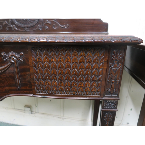 53 - A 20th century mahogany buffet table with three carved frieze drawers on square tapering supports, 1... 