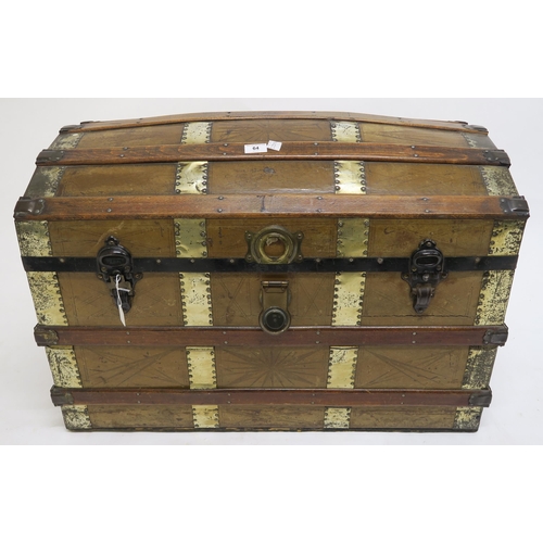 64 - A Victorian wood and brass bound dome top steamer trunk, 60cm high x 83cm wide x 49cm deep