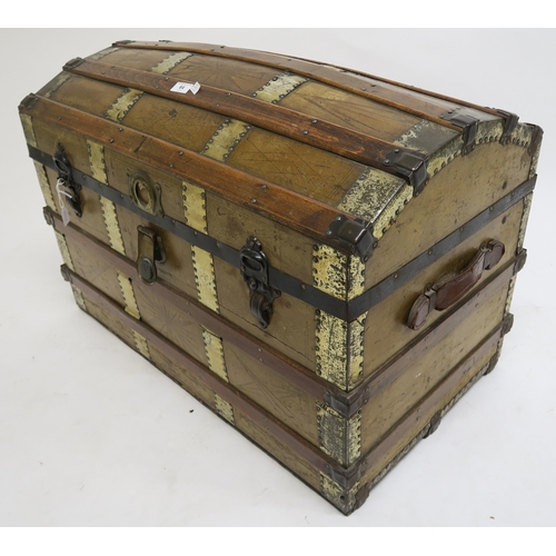 64 - A Victorian wood and brass bound dome top steamer trunk, 60cm high x 83cm wide x 49cm deep