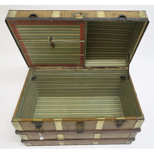 64 - A Victorian wood and brass bound dome top steamer trunk, 60cm high x 83cm wide x 49cm deep