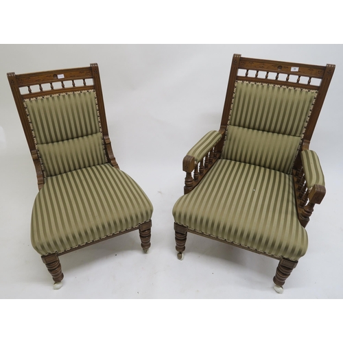 65 - A lot of two late Victorian mahogany parlour chairs one with arms, both upholstered in striped fabri... 