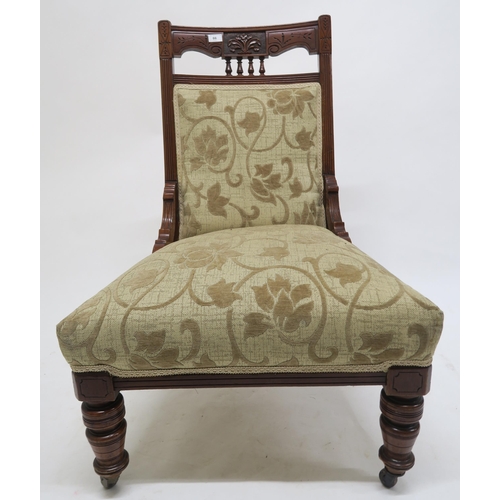 66 - A Victorian mahogany framed nursing chair