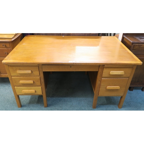 75 - An early 20th century oak desk, 78cm high x 153cm wide x 92cm deep