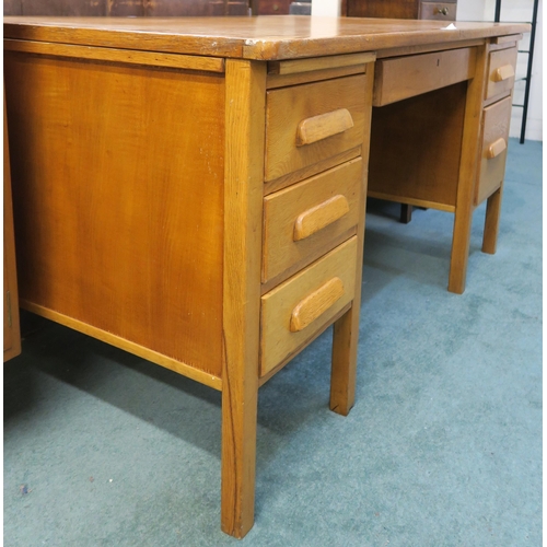 75 - An early 20th century oak desk, 78cm high x 153cm wide x 92cm deep