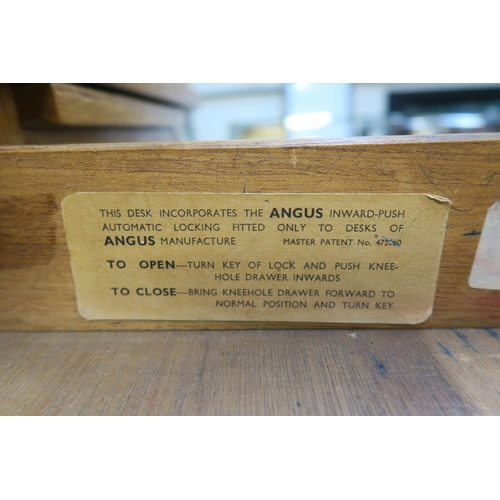 75 - An early 20th century oak desk, 78cm high x 153cm wide x 92cm deep