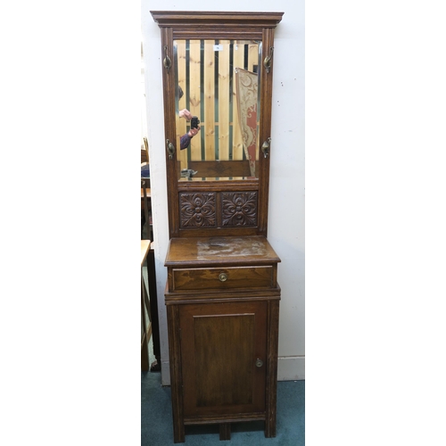 76 - An early 20th oak mirror back hall stand with single drawer above cabinet door, 182cm high x 47cm wi... 