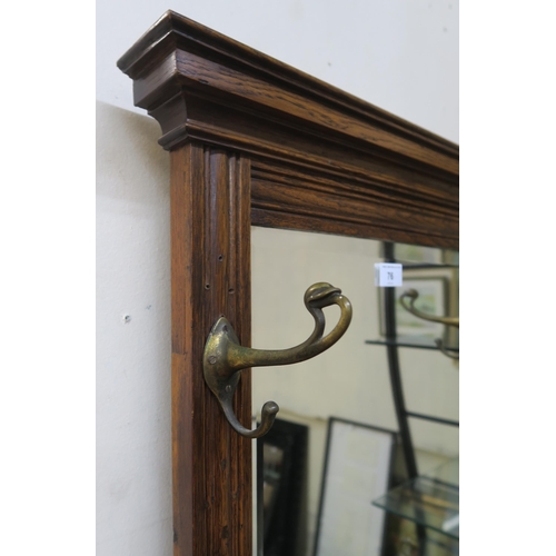 76 - An early 20th oak mirror back hall stand with single drawer above cabinet door, 182cm high x 47cm wi... 