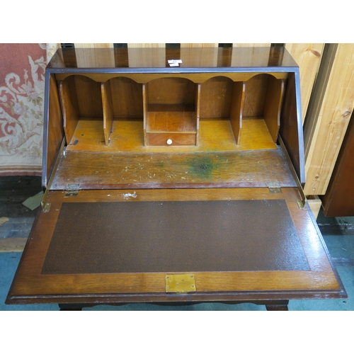 82 - A 20th century mahogany writing bureau, 99cm high x 79cm wide x 44cm deep 