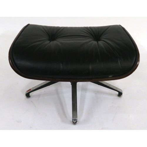 104 - A 20TH CENTURY REVOLVING LOUNGE CHAIR AND FOOTSTOOL IN THE STYLE OF CHARLES AND RAY EAMES FOR HERMAN... 