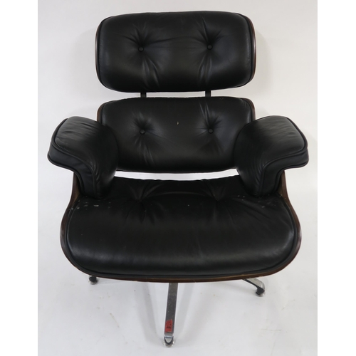 104 - A 20TH CENTURY REVOLVING LOUNGE CHAIR AND FOOTSTOOL IN THE STYLE OF CHARLES AND RAY EAMES FOR HERMAN... 