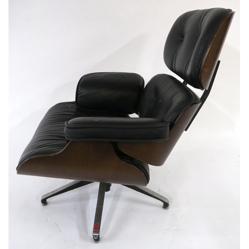 104 - A 20TH CENTURY REVOLVING LOUNGE CHAIR AND FOOTSTOOL IN THE STYLE OF CHARLES AND RAY EAMES FOR HERMAN... 