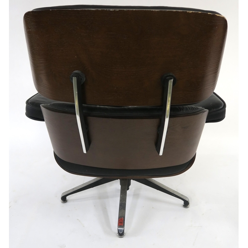 104 - A 20TH CENTURY REVOLVING LOUNGE CHAIR AND FOOTSTOOL IN THE STYLE OF CHARLES AND RAY EAMES FOR HERMAN... 