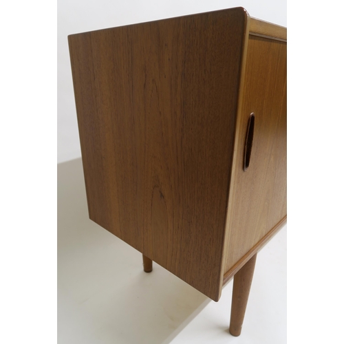 109 - A MID 20TH CENTURY TEAK NILS JONSSON FOR TROEDS SIDEBOARDwith five central drawers flanked by slidin... 