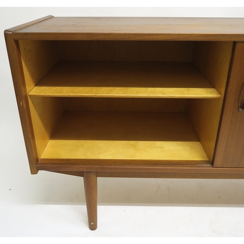 109 - A MID 20TH CENTURY TEAK NILS JONSSON FOR TROEDS SIDEBOARDwith five central drawers flanked by slidin... 