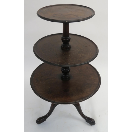 11 - A GEORGE III MAHOGANY THREE TIER DUMB WAITER with circular graduating tiers on a baluster stem and t... 