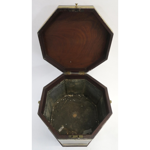 12 - AN EARLY 19TH CENTURY MAHOGANY OCTAGONAL CELLARETTE ON STAND with brass strap banding and handles on... 