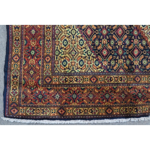 126 - A MULTICOLOURED GROUND TABRIZ RUG with red diamond central medallion and matching borders 289cm long... 