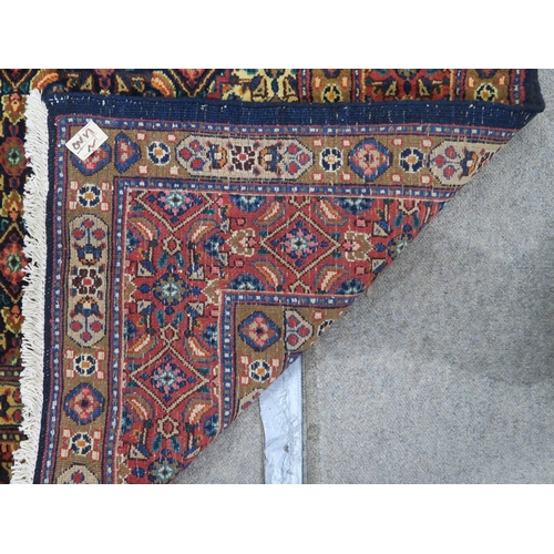 126 - A MULTICOLOURED GROUND TABRIZ RUG with red diamond central medallion and matching borders 289cm long... 