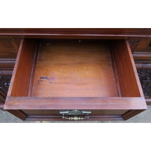 20 - A LATE VICTORIAN MAHOGANY BREAKFRONT DISPLAY CABINET with four glazed doors enclosing shelves with m... 