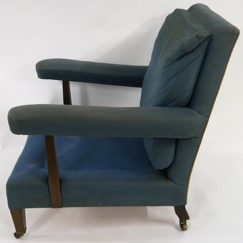 24 - A VICTORIAN HOWARD & SONS LTD MAHOGANY FRAMED UPHOLSTERED ARMCHAIR stamped 