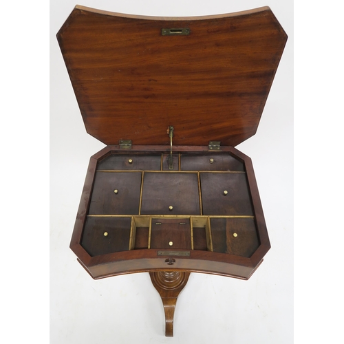 36 - A VICTORIAN MAHOGANY SEWING TABLEthe hinged lid enclosing various drawers and on a carved foliate ba... 