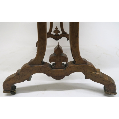 37 - A WILLIAMS AND GIBTON VICTORIAN BURR MAPLE SIDE TABLEwith single drawer on scroll legs joined by a s... 