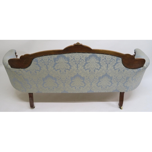 42 - A VICTORIAN MAHOGANY FRAMED SOFA,upholstered in a light blue damask fabric on turned supports, 102cm... 