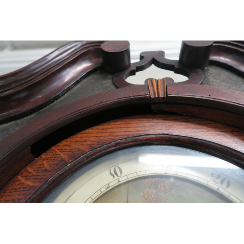 8 - A 19TH CENTURY OAK AND MAHOGANY CROSSBANDED LONGCASE CLOCK the painted dial with moon phase divided ... 