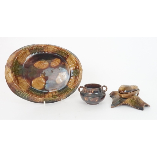 360 - A DUNMORE POTTERY OWL TOBACCO JAR with later replacement head, a grotesque toad spoon warmer, a brea... 