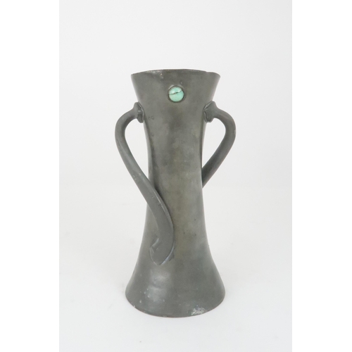 362 - ATTRIBUTED TO OLIVER BAKER FOR LIBERTY & CO, A TUDRIC PEWTER VASE with twisting handles and gree... 