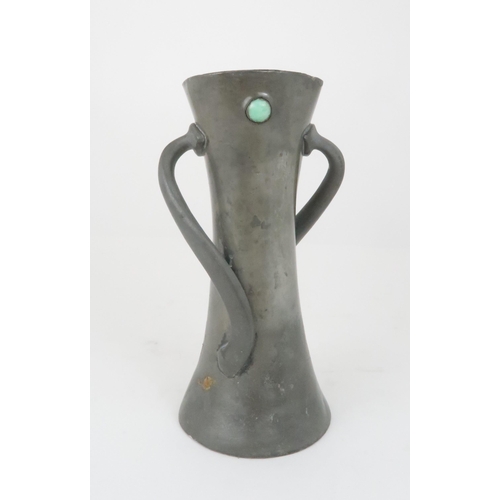 362 - ATTRIBUTED TO OLIVER BAKER FOR LIBERTY & CO, A TUDRIC PEWTER VASE with twisting handles and gree... 