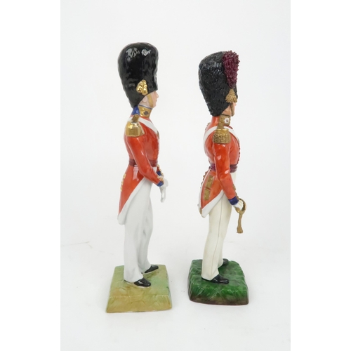 366 - A DRESDEN PORCELAIN FIGURE OF A SCOTS FUSILIER GUARDS OFFICER dress circa 1840, together with a Sitz... 