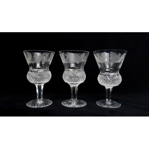 368 - A EDINBURGH CRYSTAL THISTLE SHAPED DECANTER AND SIX GLASSES each with etched thistle decoration, gla... 