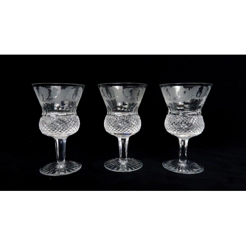 368 - A EDINBURGH CRYSTAL THISTLE SHAPED DECANTER AND SIX GLASSES each with etched thistle decoration, gla... 