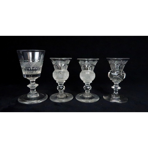 369 - A SUITE OF EDINBURGH THISTLE SHAPED GLASSWARE including seven flute champagne glasses, 17cm high, si... 