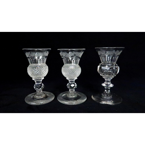 369 - A SUITE OF EDINBURGH THISTLE SHAPED GLASSWARE including seven flute champagne glasses, 17cm high, si... 