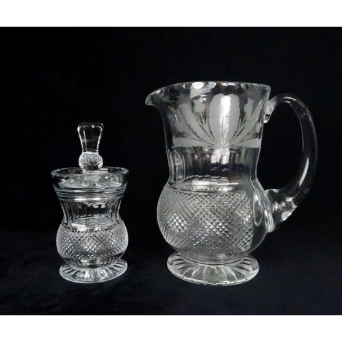 369 - A SUITE OF EDINBURGH THISTLE SHAPED GLASSWARE including seven flute champagne glasses, 17cm high, si... 