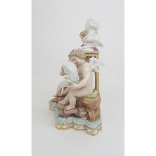 371 - A MEISSEN ALLEGORICAL GROUP DEPICTING SCULPTURE modelled as three putti, one holding a hammer and ch... 