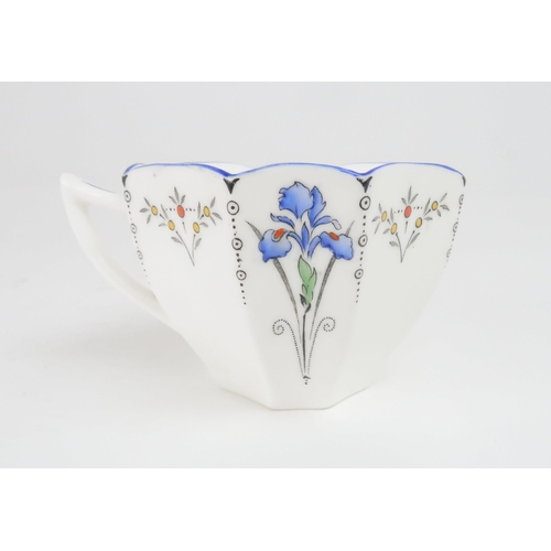 372 - A SHELLEY ART DECO QUEEN ANNE BLUE IRIS TEA AND DESSERT SETcomprising two serving bowls, twelve dish... 