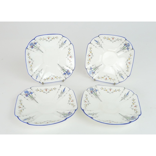 372 - A SHELLEY ART DECO QUEEN ANNE BLUE IRIS TEA AND DESSERT SETcomprising two serving bowls, twelve dish... 