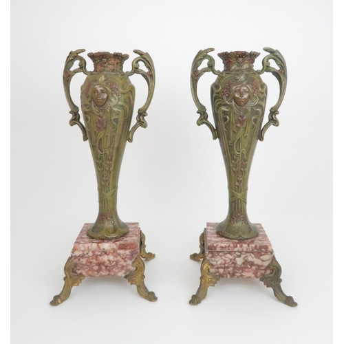 373 - A PAIR OF FRENCH ART NOUVEAU SPELTER VASESeach with a maidens profile and painted green patination, ... 